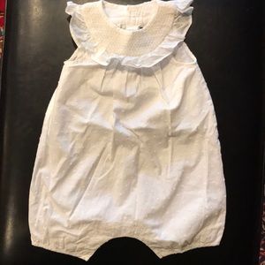 Lili Gaufrette Swiss dot romper with gold smocking
